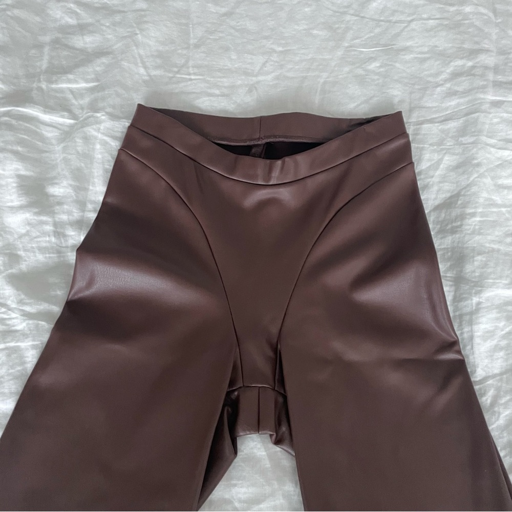 Skims brown leather flare pants